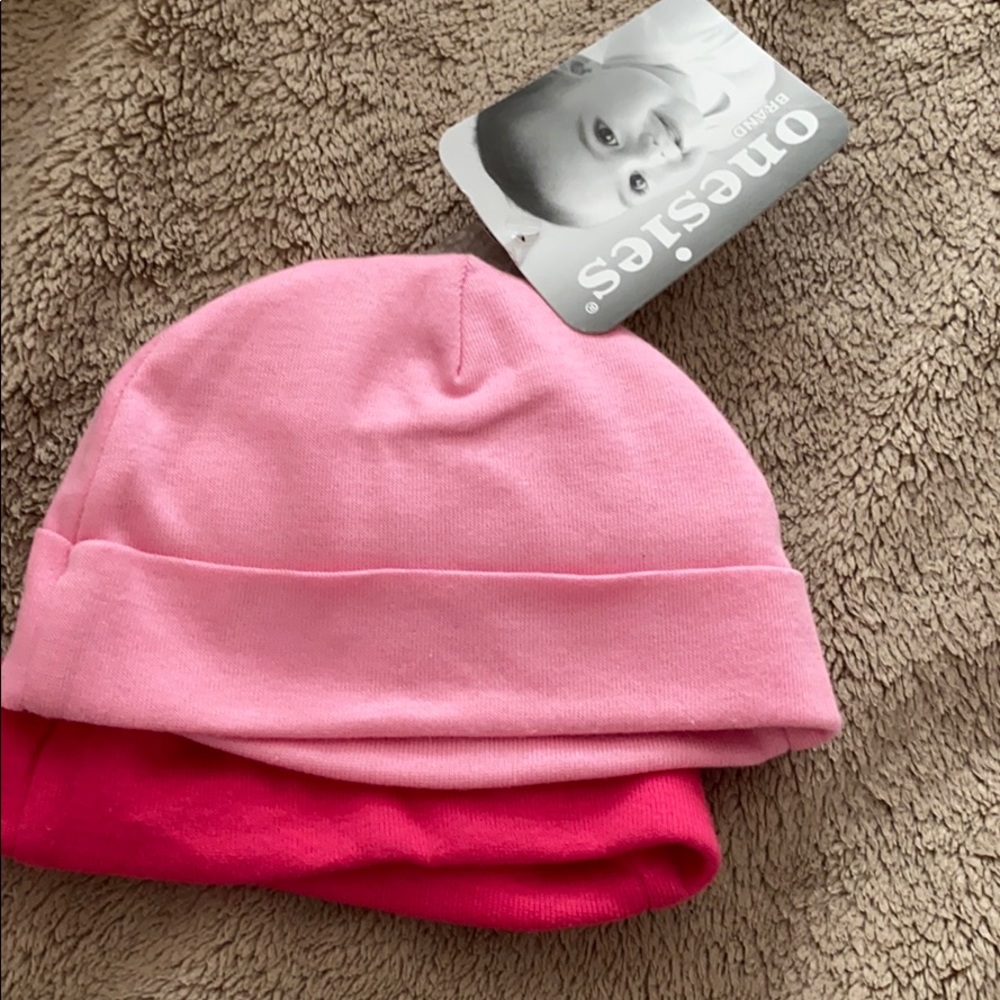 2 pink hats